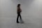 Isolated blurry person walks