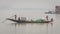 An isolated boat on river Hooghly with poor fishermen hunting for fishes