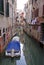 Isolated boat on venice channel