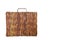 Isolated brown rattan suitcase on white