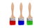 Isolated brushes. Three brushes with red, blue and green paint are isolated on a white background.