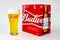 An isolated Budweiser beer pint and six pack beer on a white background