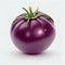 Isolated Cherokee Purple Tomato on a white background.