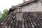 Isolated chimney on the roof of an ancient house