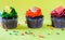 Isolated Chocolate Cupcakes on Yellow Background