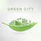 Isolated city buildings on green leaf design