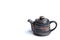 Isolated clay teapot on white background.