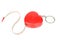 Isolated close up red heart measuring tape