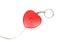 Isolated close up red heart measuring tape