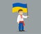 Isolated cute ukrainian boy wearing national costume and holds big ukrainian national flag.
