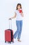 Isolated cutout studio full body shot of Millennial Asian young female teenager traveler in casual outfit standing holding