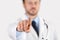 Isolated doctor hand touch screen pointing with your finger on white copy space background