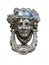 Isolated door knocker â€“ antique head on the entrance of a house on Malta. Italian traditional doorknob on white background . Old