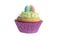 Isolated easter cupcake with green frosting and mini eggs