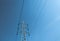isolated electrical tower in the blue sky