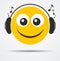 Isolated Emoticon with headphones in a flat design