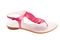 Isolated female leather pink sandal with pearly luster is on white