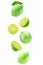 Isolated flying lime fruit wedges