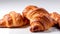 Isolated fresh, rosy croissants