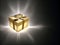 Isolated Gift in a Golden Wrapped Box with a Golden Bow with Open Text Area, created with Generative AI technology