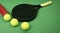 Isolated on green paddle tennis racket
