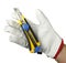 Isolated hand witch working glove holding cutting knife