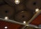 Isolated hanging ceiling lights of a restaurant photograph