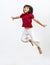 Isolated happy young girl jumping and flying to express imagination