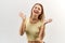 Isolated high contrast Studio portrait of happy joyful young woman girl in yellow shirt with rapturous emotions