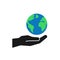 Isolated icon of green planet, earth in black hand on white background. Color globe and hand. Symbol of care, protection. Save