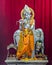 Isolated idol of Hindu God Krisna with flute in a temple at Somnath.