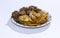 Isolated Iftar Set ofBasin pakoda or pakora Popular Islamic food on white background