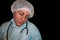 Isolated image of doctor or nurse sleep. Coronavirus COVID-19 pandemic. Tired, exhausted woman in uniform is sleeping in hospital