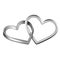 isolated intertwined heart shaped silver rings for wedding and valentine`s day
