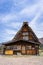 Isolated Japanese Gassho-style house at the entrance of Shira