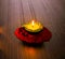 Isolated lit diya/lamp placed to celebrate diwali and dhanteras