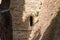 Isolated loophole in a castle brick walls Fiorenzuola di Focara, Italy, Europe