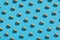 Isolated nuts pattern backdrop. almond on blue background. Top view