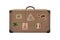 Isolated old retro traveler suitcase with travel stickers on white background