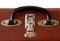 Isolated Old Vintage Dusty Brown SuitcaseIsolated Handle of an Old Vinatge Dusty Brown Suitcase