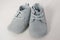 Isolated pair of blue suede leather baby shoes, cute children lace-up soft sole footwear