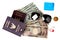 Isolated of passport ,eye glasss,small relax hat ,action camera and mobile socket sim place on banknote for the time of relaxation