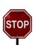 Isolated photograph of a stop sign in the street white background