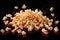 Isolated popcorn on black background, capturing the falling or flying