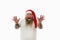 Isolated portrait on a white background of an overweigh man in Santa Claus hat raising palms and has surprised looks. Man with