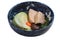 Isolated Pressure cooker pork belly Kakuni with cabbage, Japanese scallion, shiitake, carrot served in blue ceramic bowl