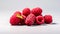 Isolated raspberries on a sophisticated gray background.