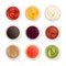 Isolated realistic sauces top view in white bowls. Sauce condiments, dips or dressings for dishes. Pesto, ketchup and