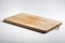 Isolated rectangular wooden chopping board