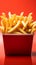 Isolated red box holds delicious fries in a tempting display